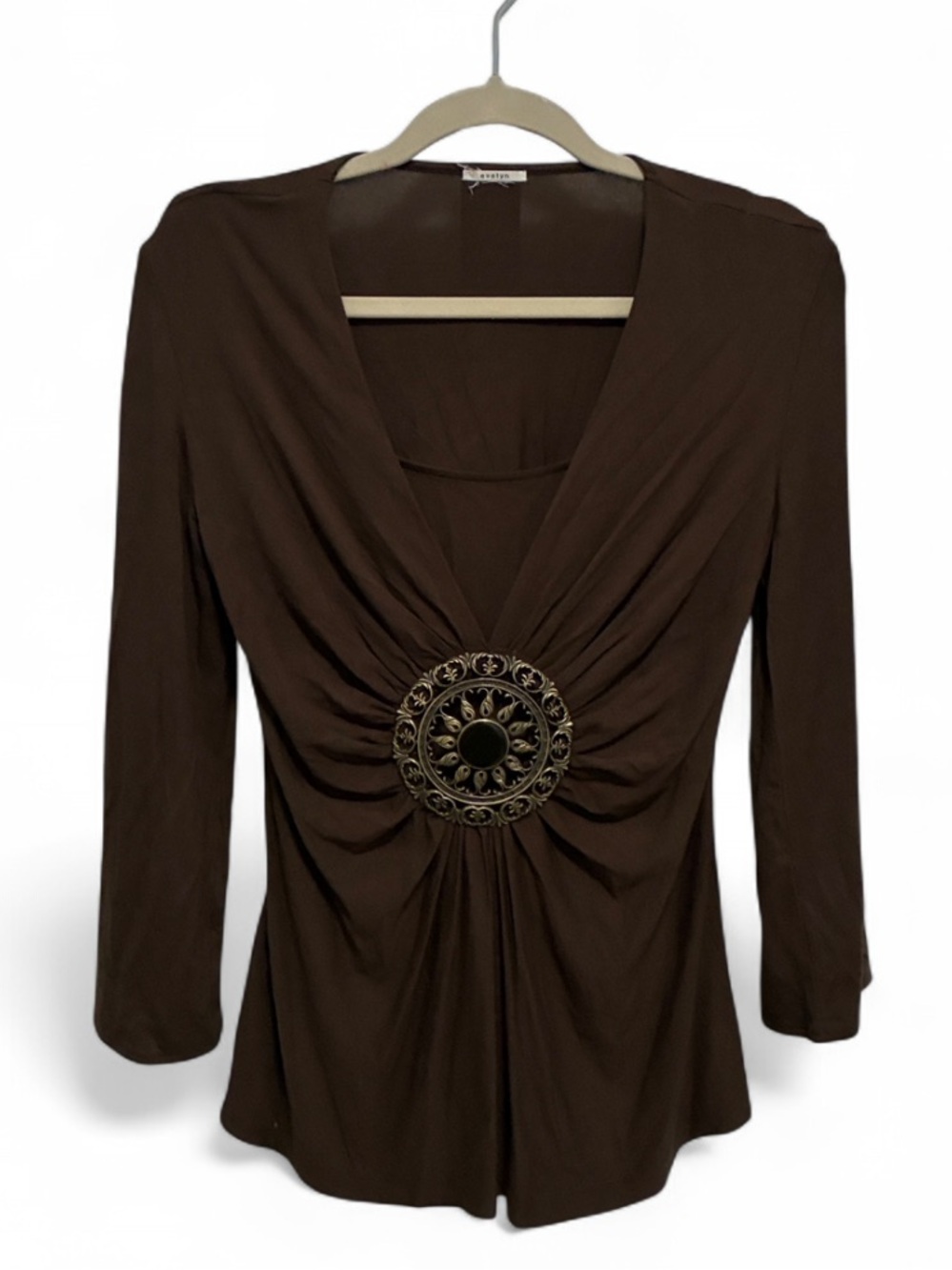 Evelyn Brown V-Neck Gathered Front Top with Decorative Medallion
